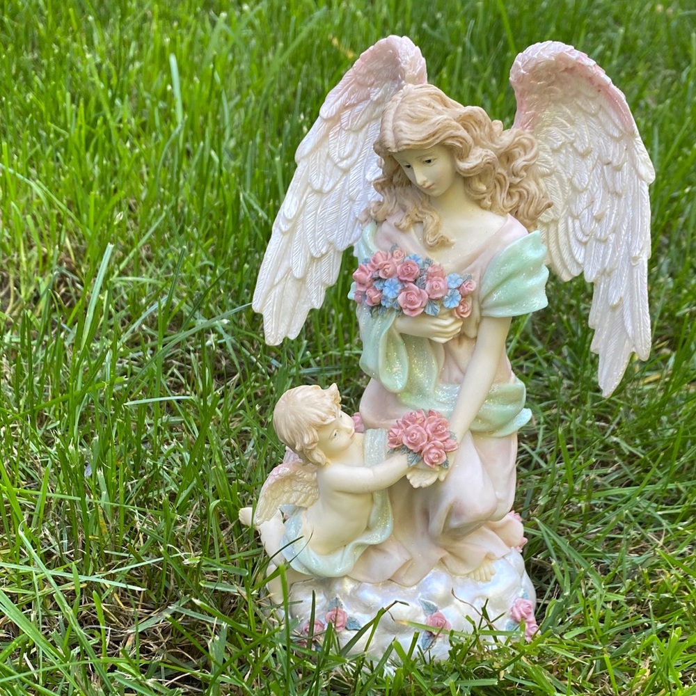 Angel Figurine with Child and Flowers